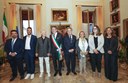 Michael Mann con il sindaco Muzzarelli, l'assessore regionale Mauro Felicori e i rappresentanti degli enti locali che hanno collaborato alla produzione del film